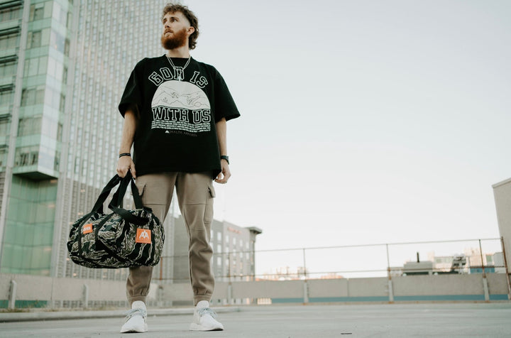 ‘God Is With Us’ Garment - Dyed Tee - Black - Malta Apparel